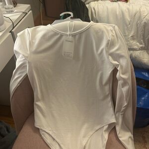 white bodysuit